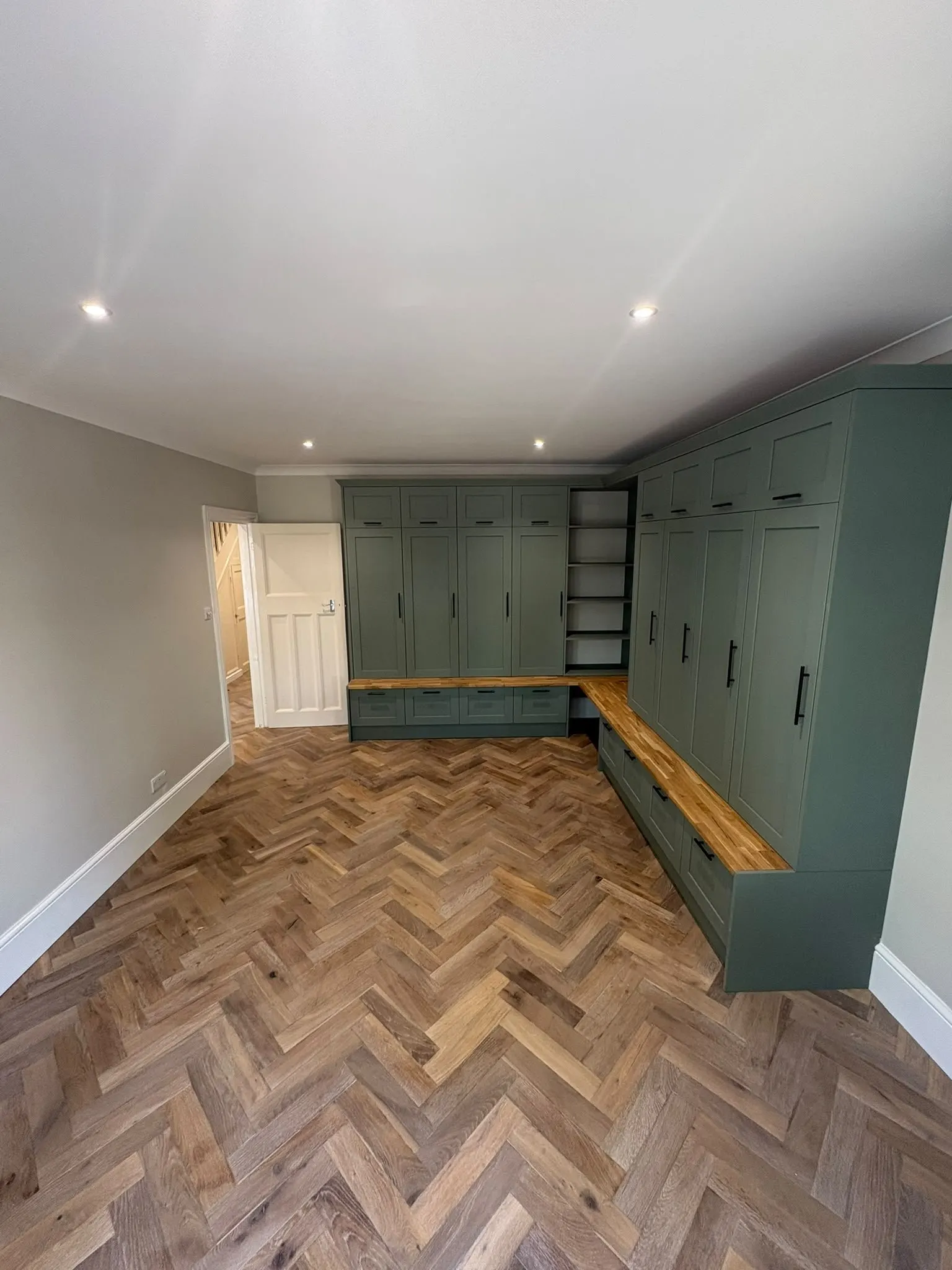 Fitted storage with herringbone floor
